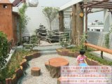 英德龍山莊天臺(tái)花園雨花石鋪地、塑樹(shù)樁臺(tái)凳